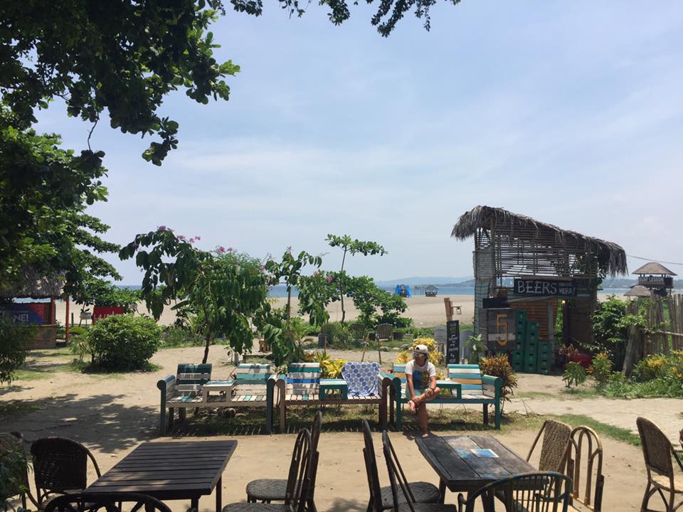 Wooden artisan chairs and tables at the Flotsam and Jetsam (with Abi!)